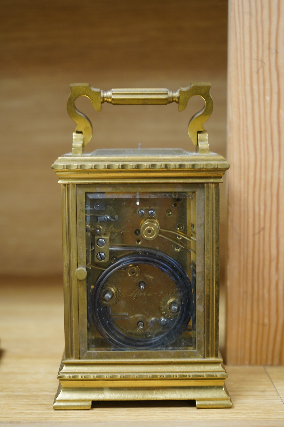 An early 20th century French brass cased carriage clock for the Italian market, with repeat, button missing, no key, 19cm high